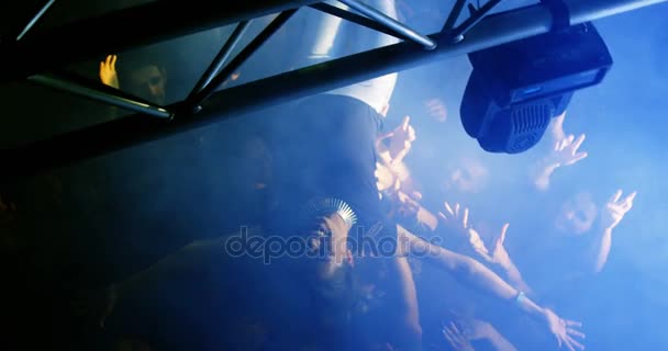 Crowd surfing at a concert — Stock Video