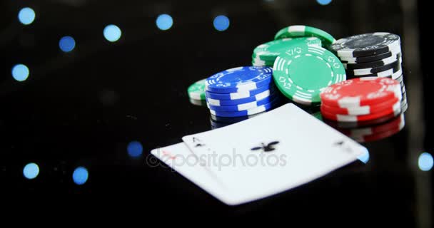 Playing cards and casino chips on poker table — Stock Video