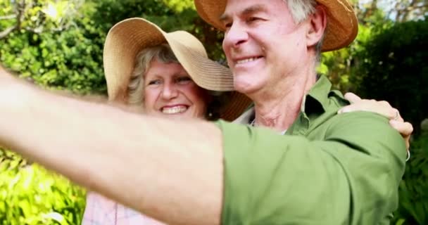 Senior couple taking selfie with mobile phone — Stock Video