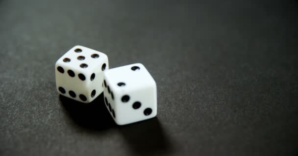 Pair of dice on poker table — Stock Video
