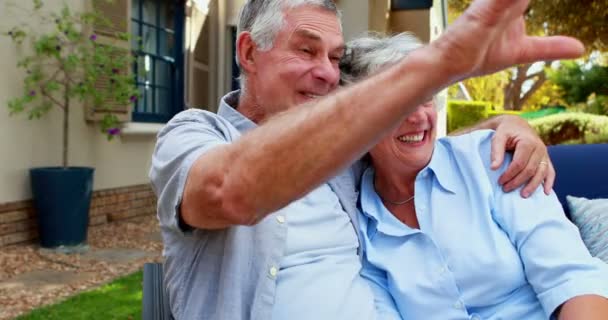 Romantic senior couple kissing each other — Stock Video