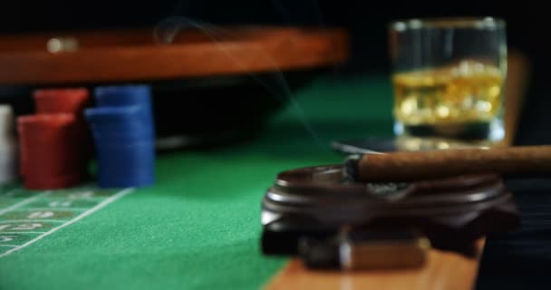 Casino chips, cigar and glass of beer — Stock Video