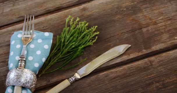 Various cutlery on wooden table — Stock Video