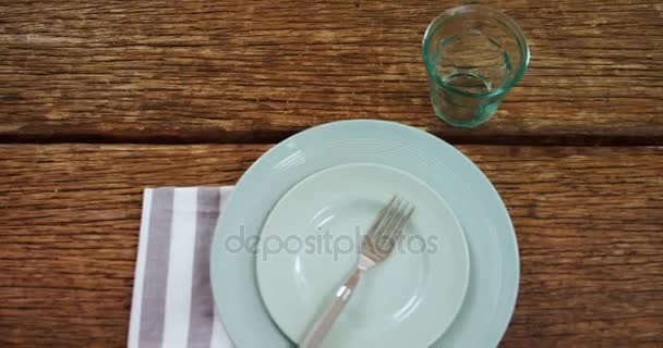 Various cutlery on wooden table — Stock Video