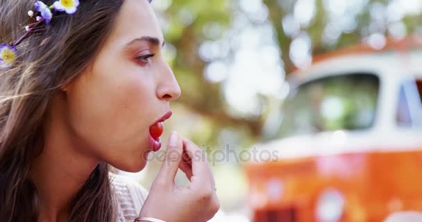 Couple having berries at music festival — Stock Video