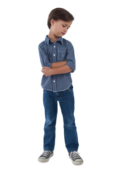 Boy standing against white background — Stock Photo, Image