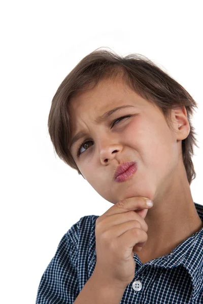 Boy standing against white background — Stock Photo, Image