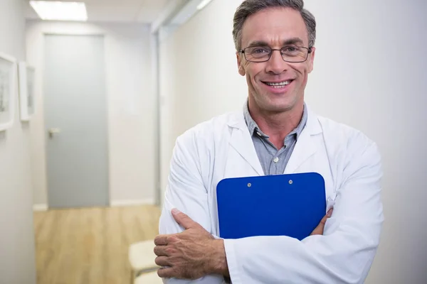 Dentist holding file — Stock Photo, Image