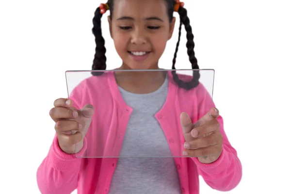 Girl using glass digital tablet — Stock Photo, Image