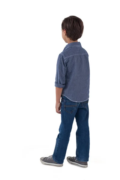 Boy standing against white background — Stock Photo, Image