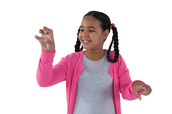 Girl pretending to touch an invisible screen — Stock Photo, Image