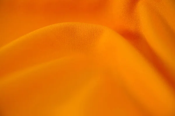 Närbild av orange textil — Stockfoto