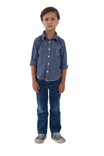 Boy standing against white background — Stock Photo, Image