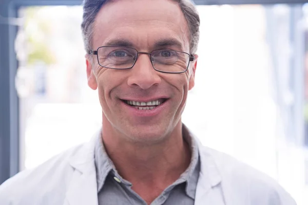 Smiling dentist with eyeglasses — Stock Photo, Image