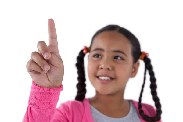 Meisje voorwenden om een onzichtbare touchscreen — Stockfoto