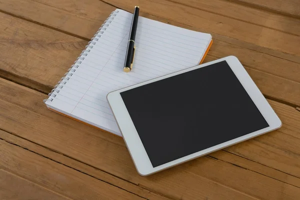 Blank notepad and digital tablet — Stock Photo, Image