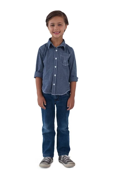 Boy standing against white background — Stock Photo, Image