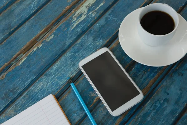 Café, téléphone, crayon et livre — Photo