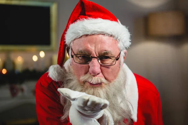 Weihnachtsmann bläst Kuss — Stockfoto