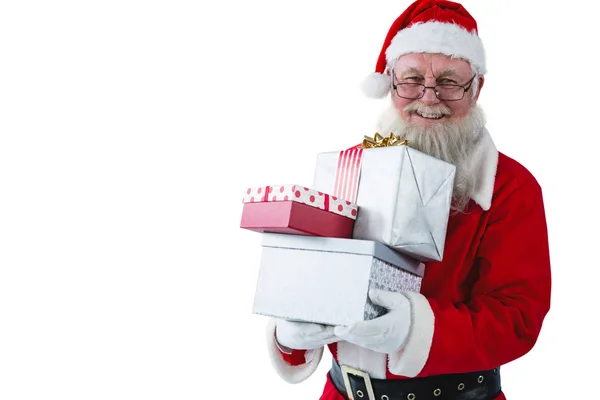 Papai Noel segurando caixas de presente — Fotografia de Stock