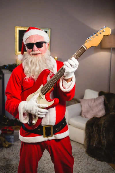 Papai Noel tocando guitarra — Fotografia de Stock