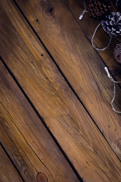 Christmas light on wooden plank — Stock Photo, Image