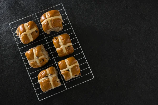 Hot cross bun on baking tray — Stock Photo, Image