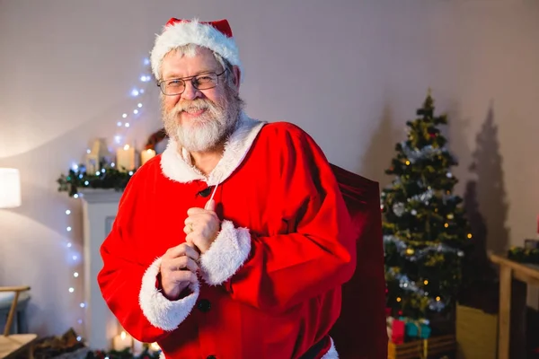 Santa claus håller jul väska — Stockfoto