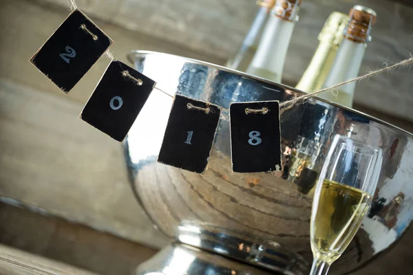 Champagne bottles in ice bucket