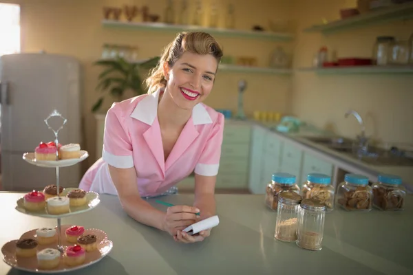 Waitress taking order in restaurant — Stock Photo, Image