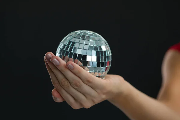 Woman holding mirror ball — Stock Photo, Image