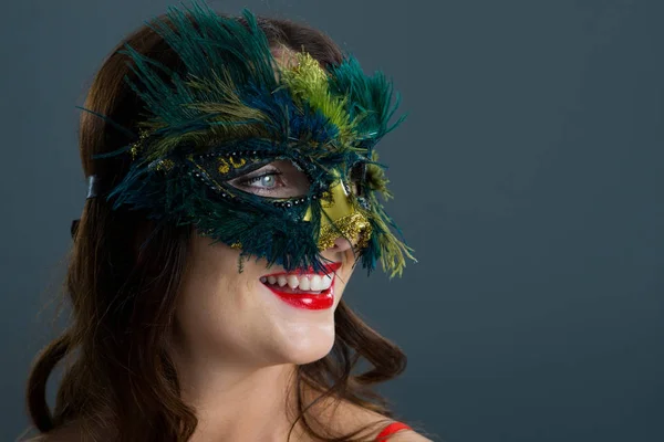 Woman wearing masquerade mask — Stock Photo, Image