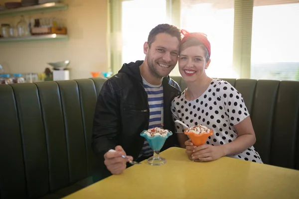 Couple romancing in restaurant — Stock Photo, Image