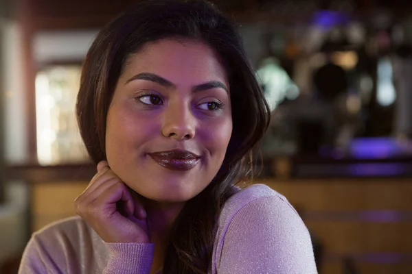 Woman smiling in the bar — Stock Photo, Image