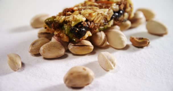 Pistachio and granola bar — Stock Video