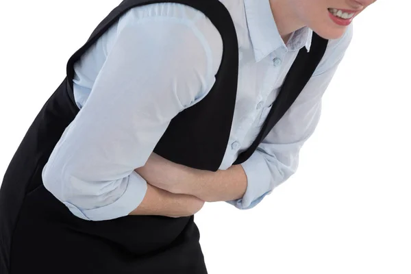 Kobiet wykonawczej cierpi na ból brzucha — Zdjęcie stockowe