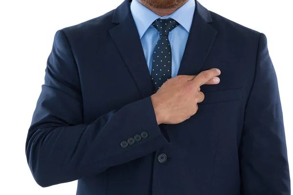 Businessman holding his finger crossed — Stock Photo, Image