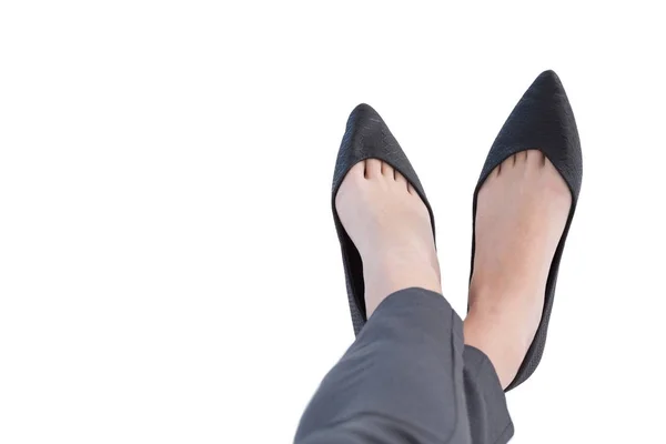 Female executives legs crossed at ankle — Stock Photo, Image