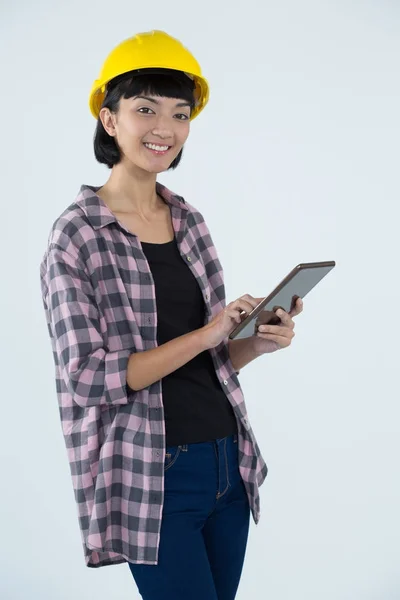 Female architect using tablet — Stock Photo, Image