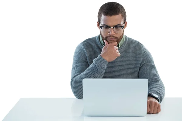 Man using laptop against white background — Stock Photo, Image