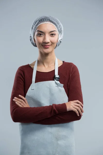 Female chef standing with arms crossed — Stock Photo, Image