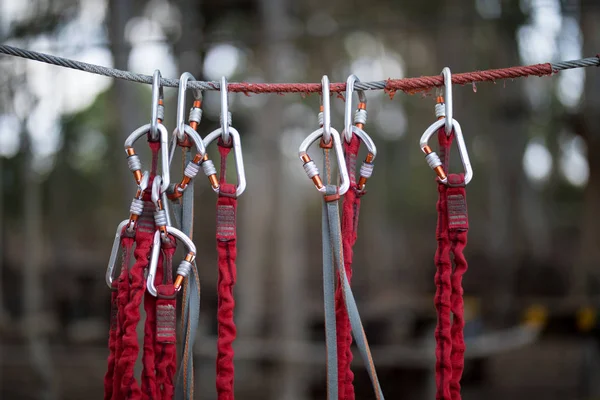 Carabiner hanging on wire rope — Stock Photo, Image