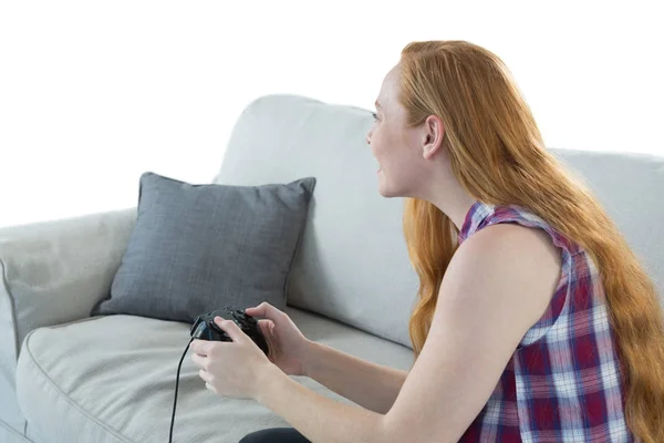 Женщина, играющая в видеоигры — стоковое фото