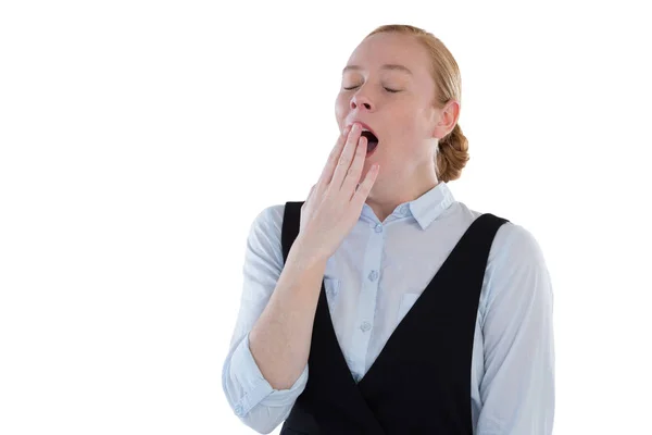 Female executive yawning — Stock Photo, Image
