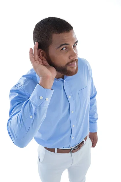 Manliga verkställande lyssnande i hemlighet — Stockfoto
