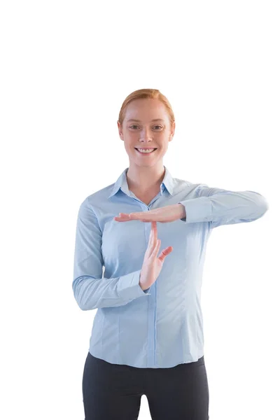 Female executive making time out sign — Stock Photo, Image