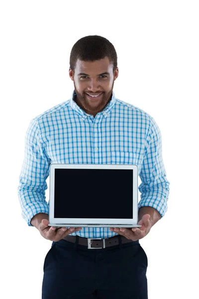 Male executive holding laptop — Stock Photo, Image