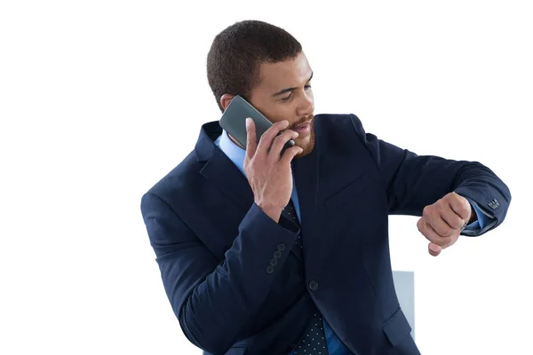 Businessman checking time — Stock Photo, Image