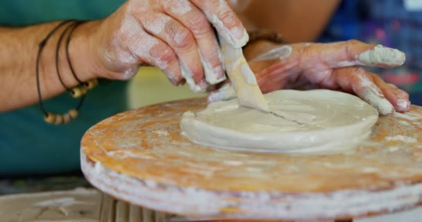 Man carving clay — Stock Video