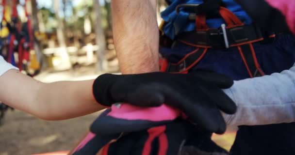 Trainer and kids performing a hand stack — Stock Video